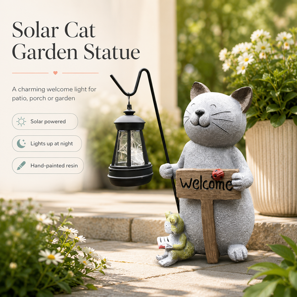 Solar Cat Garden Statue in a real garden setting, featuring a gray cat holding a wooden 'Welcome' sign and a small green frog, with a black solar lantern hanging beside it. Text on the left describes the solar-powered light and garden statue.