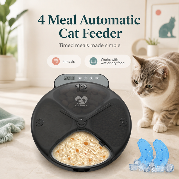 A round black automatic cat feeder with a digital display and a transparent food window showing wet cat food inside. A gray tabby cat is sitting to the right, and the background is a bright, modern room with text overlays reading '4 Meal Automatic Cat Feeder'.